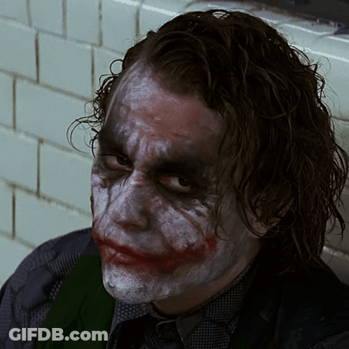 A Close Up Of A Man 'S Face With White Paint GIF