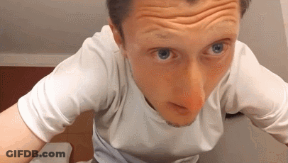 A Close Up Of A Man 'S Face With Wrinkles And Blue Eyes GIF