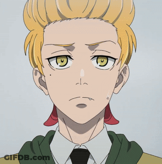 A Close Up Of A Man 'S Face With Yellow Hair GIF
