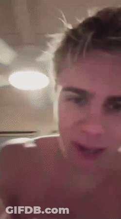 A Close Up Of A Man 'S Face Without A Shirt On GIF