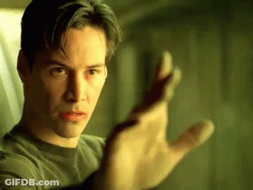 A Close Up Of A Man 'S Hand Reaching Out Towards The Camera GIF