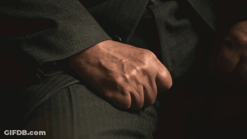 A Close Up Of A Man 'S Hand With A Ring On It GIF