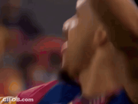 A Close Up Of A Man 'S Head With A Blurry Background GIF