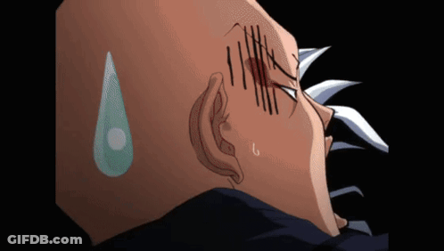 A Close Up Of A Man 'S Head With A Tear Coming Out Of His Eye GIF