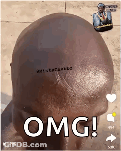 A Close Up Of A Man 'S Head With The Word Omg Written On It . GIF