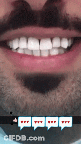 A Close Up Of A Man 'S Mouth With A Speech Bubble That Says ' I Love You ' GIF