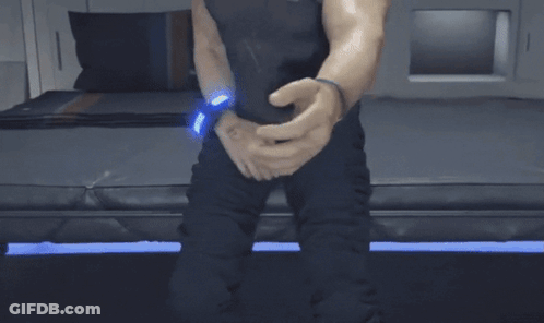 A Close Up Of A Man 'S Muscles In A Gym . GIF