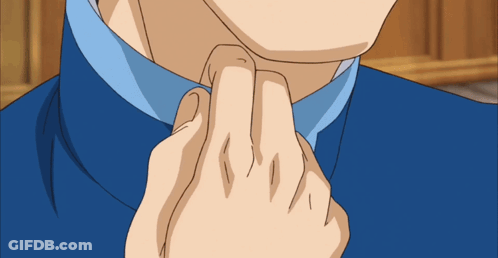 A Close Up Of A Man 'S Neck With A Blue Shirt GIF