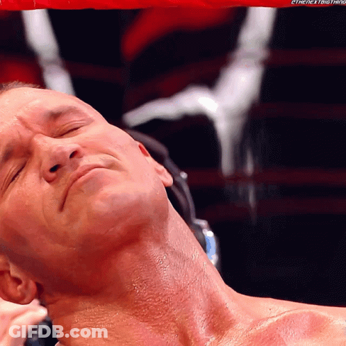 A Close Up Of A Man 'S Neck With The Hashtag #Thenextbig Thing Visible GIF