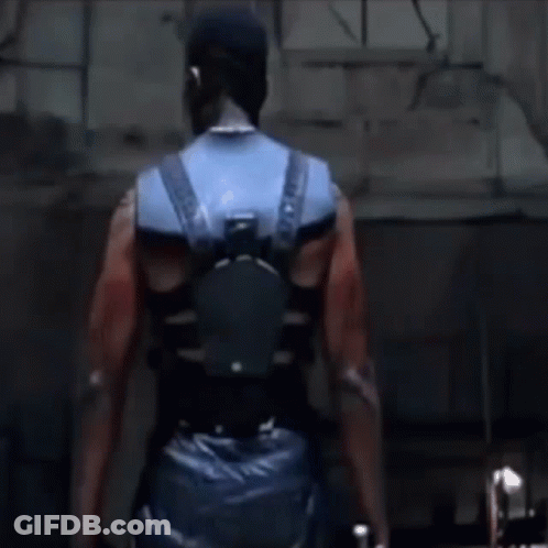 A Close Up Of A Man 'S Shoulder With A Tattoo On It GIF
