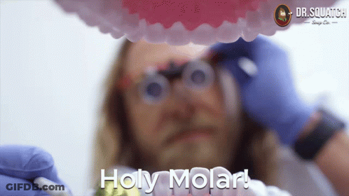 A Close Up Of A Man 'S Teeth With The Words Holy Molar Written On The Bottom GIF