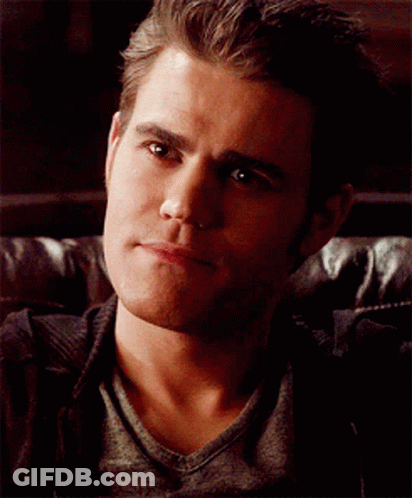 A Close Up Of A Man Sitting On A Couch GIF