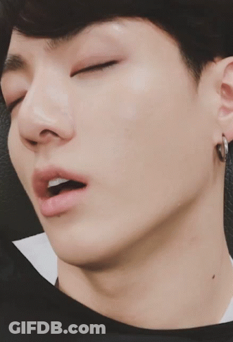 A Close Up Of A Man Sleeping With His Eyes Closed GIF