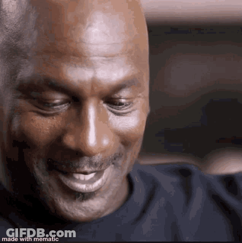 A Close Up Of A Man Smiling With His Eyes Closed GIF