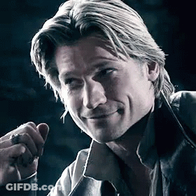 A Close Up Of A Man Smoking A Cigarette In A Dark Room . GIF