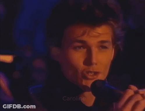 A Close Up Of A Man Taking A Picture With The Name Caroline Visible GIF