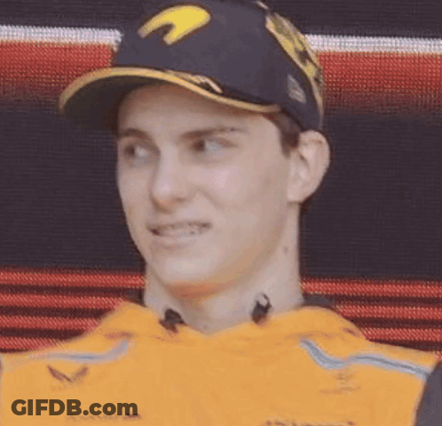 A Close Up Of A Man Wearing A Baseball Cap And A Yellow Shirt . GIF