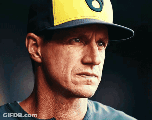 A Close Up Of A Man Wearing A Baseball Cap With The Letter O On It GIF