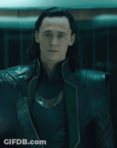 A Close Up Of A Man Wearing A Black And Green Outfit GIF