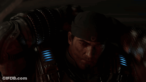 A Close Up Of A Man Wearing A Black Headband With A W On It GIF