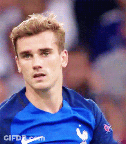 A Close Up Of A Man Wearing A Blue Nike Shirt GIF