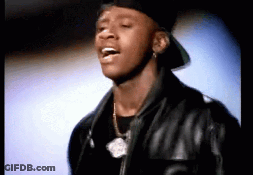 A Close Up Of A Man Wearing A Hat And A Leather Jacket GIF
