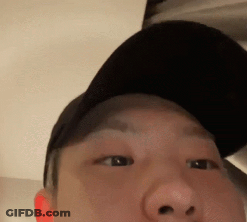 A Close Up Of A Man Wearing A Hat GIF