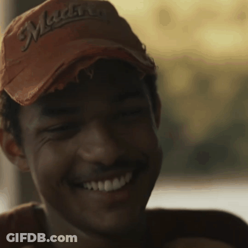 A Close Up Of A Man Wearing A Hat That Says ' Montana ' On It GIF