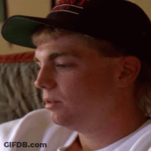 A Close Up Of A Man Wearing A Hat That Says ' Washington ' GIF