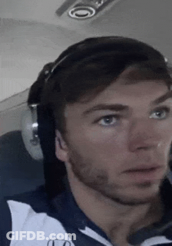 A Close Up Of A Man Wearing A Helmet And Sunglasses . GIF