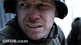 A Close Up Of A Man Wearing A Helmet Smiling GIF