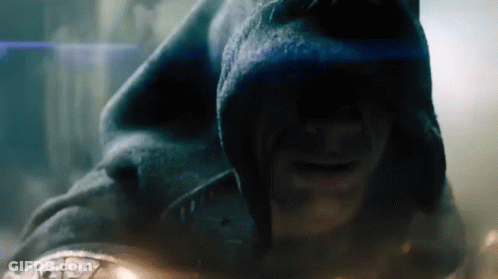 A Close Up Of A Man Wearing A Hood And Smiling GIF
