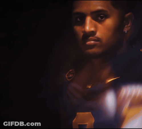 A Close Up Of A Man Wearing A Jersey With The Number 7 On It GIF