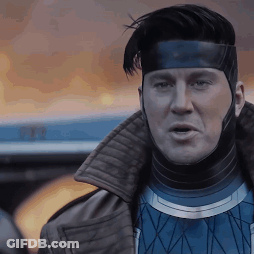 A Close Up Of A Man Wearing A Mask And A Jacket GIF