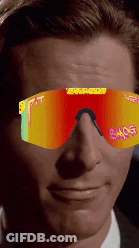 A Close Up Of A Man Wearing A Pair Of Sunglasses That Says ' Enjoy ' On Them GIF