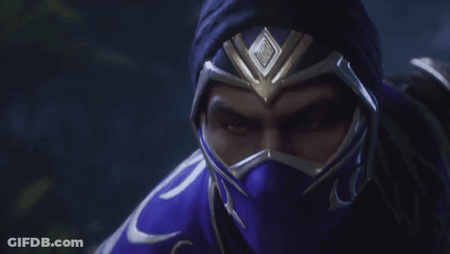A Close Up Of A Man Wearing A Purple Mask And Helmet GIF