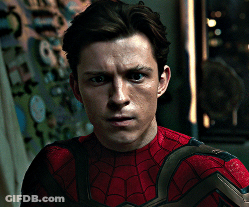 A Close Up Of A Man Wearing A Spiderman Costume GIF