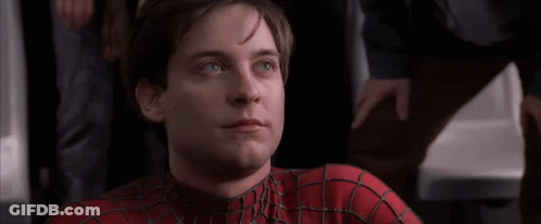 A Close Up Of A Man Wearing A Spiderman Costume GIF