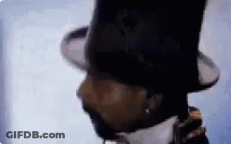 A Close Up Of A Man Wearing A Top Hat And A Beard . GIF