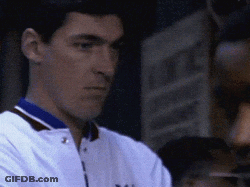A Close Up Of A Man Wearing A White Jacket With A Blue Collar That Says Yale GIF