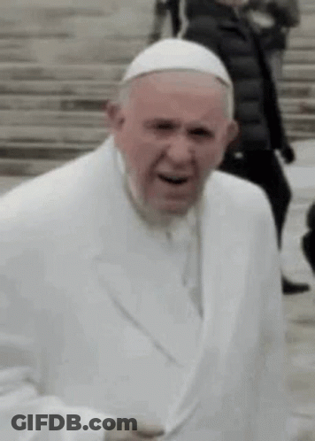 A Close Up Of A Man Wearing A White Suit And Hat . GIF