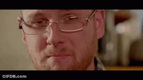 Close Up Of Man With Glasses And Beard GIF