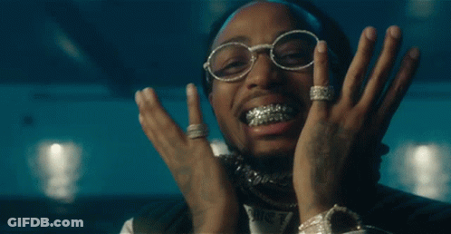 Close Up Of Man Wearing Glasses And Chain GIF