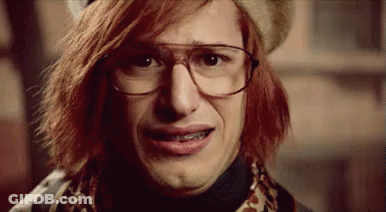 Close Up Of Man Wearing Glasses And Hat Making Face GIF