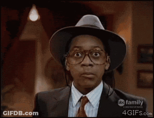 A Close Up Of A Man Wearing Glasses And A Hat With Abc Family On The Bottom GIF