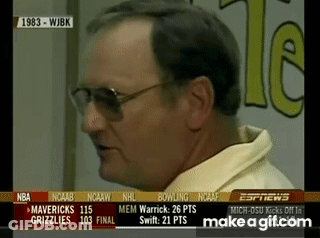A Close Up Of A Man Wearing Glasses And A Yellow Shirt On Espn News GIF