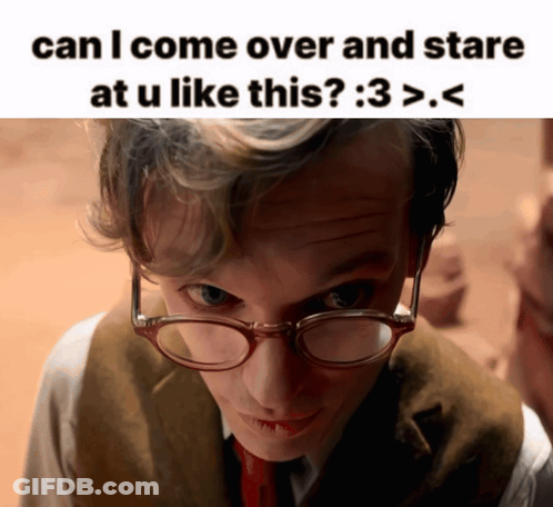 A Close Up Of A Man Wearing Glasses With The Caption Can I Come Over And Stare At U Like This : 3 > < GIF