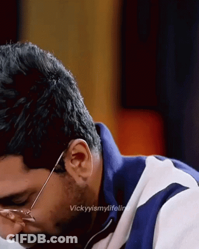 A Close Up Of A Man Wearing Glasses With The Caption Vickyismylifeline On The Bottom GIF