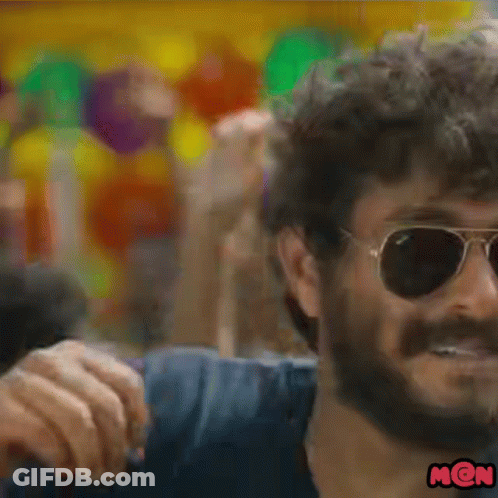A Close Up Of A Man Wearing Sunglasses And A Mon Sticker GIF