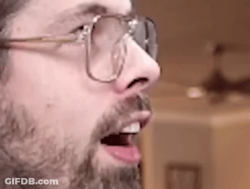 Close Up Of Man With Beard And Glasses GIF